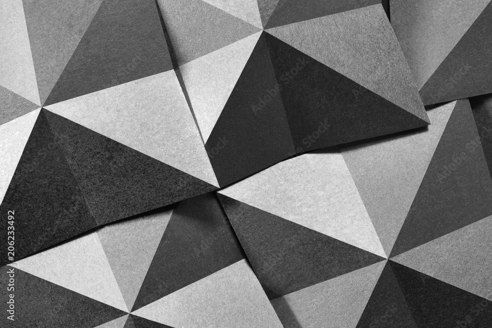Geometric shapes of paper in black and white, grainy paper texture Geometric shapes of paper in black and white, grainy paper texture