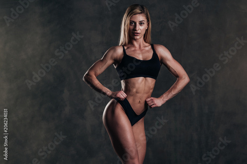 Studio Shot of a Stunning Hot Sporty Body of a Fitness Woman with Perfect Forms