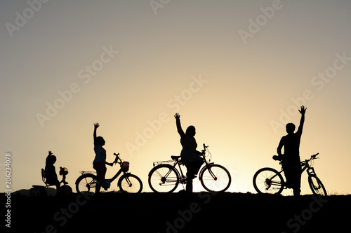family group cycling and pleasant driving