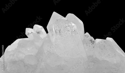 Close-up of a specimen of rock crystal on black background