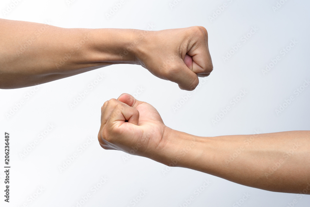 Male clenched fist represents the strength or acting in the fighting Male clenched fist represents the strength or acting in the fighting