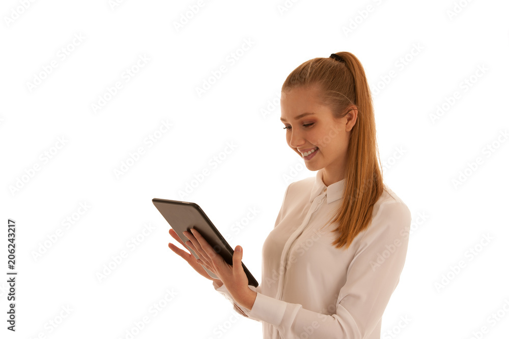 Beautiful business woman surf the internet on tablet isolated over white Beautiful business woman surf the internet on tablet isolated over white