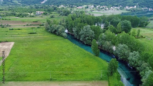 Aerial view of a lake and a river in Pomezia near Rome. Country green and trees. Lake solfatara and Lake posta fibreno

 photo