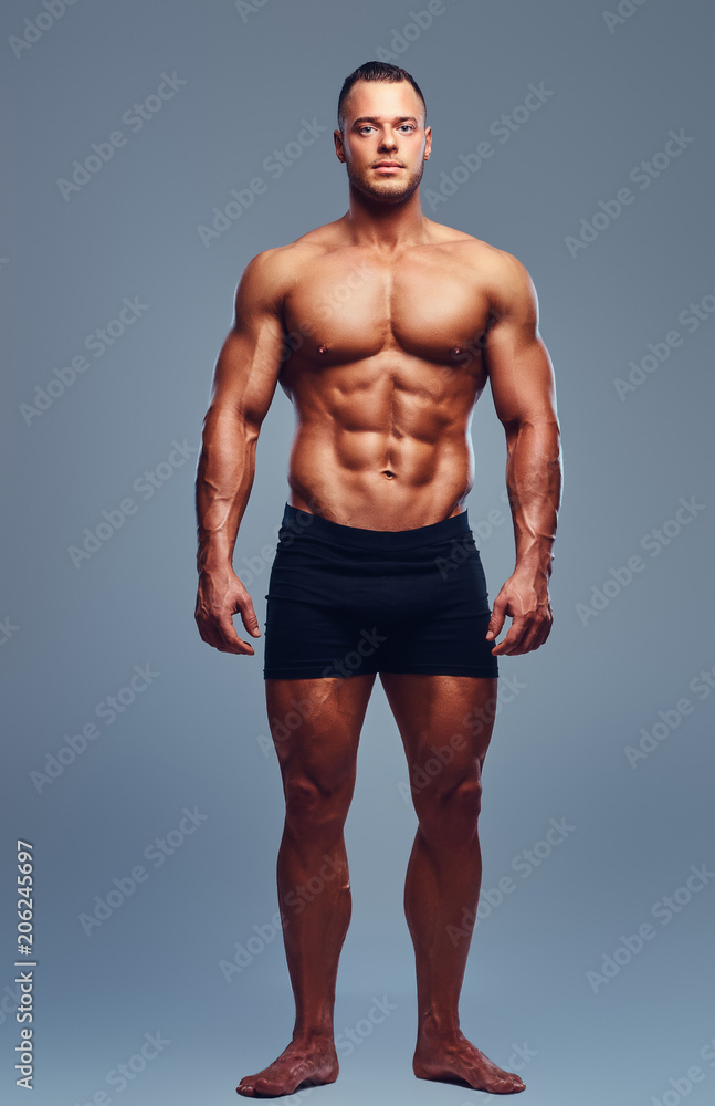 Full body image of male bodybuilder.