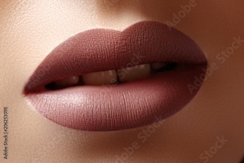 Close-up Female Lips with Fashion Natural coffee Lipstick Makeup. Macro Sexy Lip Stick Make-up photo