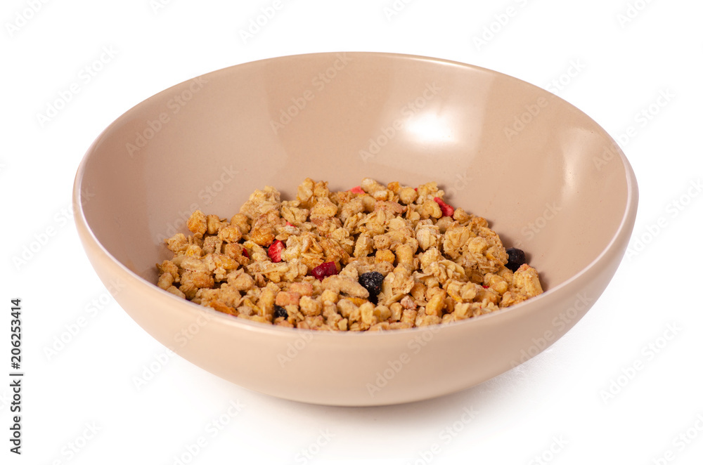 Granola with fruit in plate on a white background isolation Granola with fruit in plate on a white background isolation
