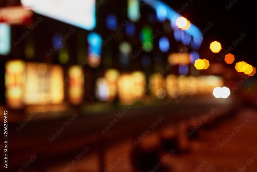 Abstract blurred background of colorful city lights at night