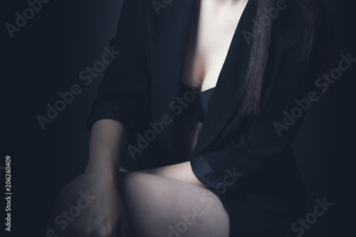 Close up of an attractive girl of on dark background