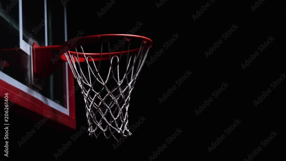 Close up of a slam dunk on a basketball hoop Close up of a slam dunk on a basketball hoop