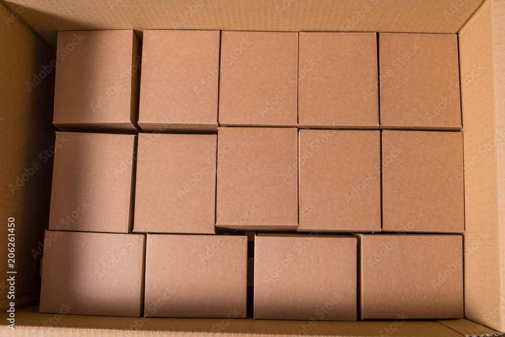 Small Boxes Inside Large Container Stock Photo 1097350802