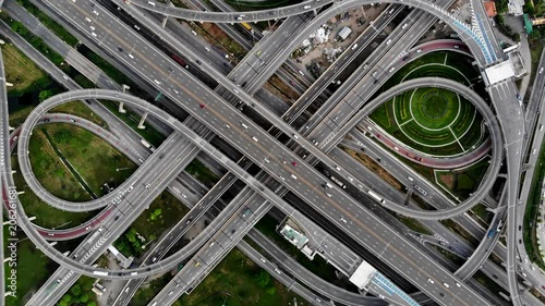 Bangkok Expressway top view, Top view over the highway,expressway and motorway. Aerial view interchange of a Thailand Bangkok city, Shot from 4K HD drone.
