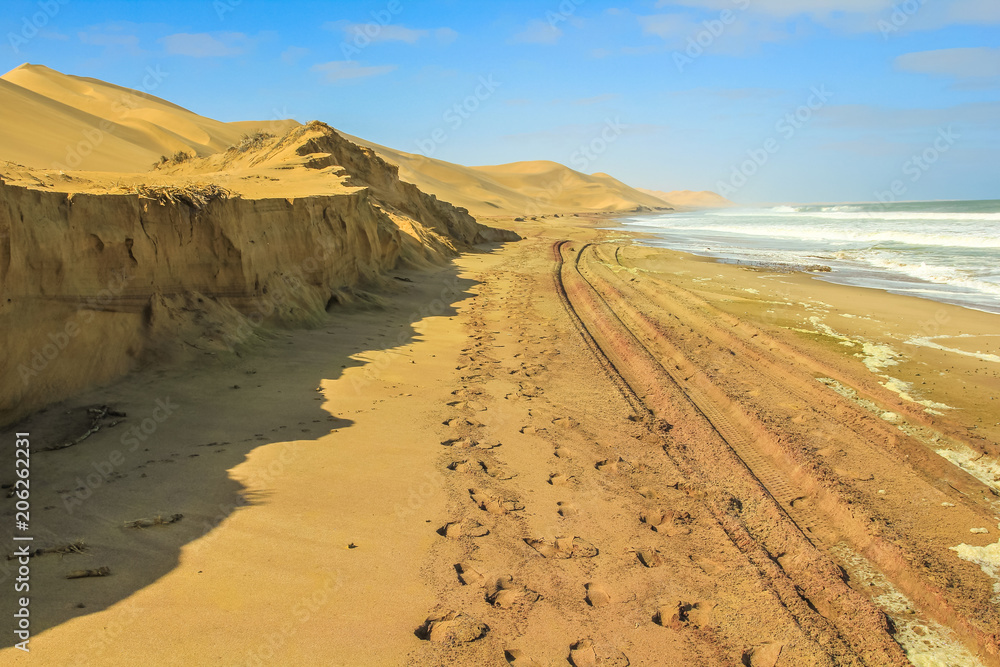 Dunes of Sandwich Harbour, Walvis Bay, is a part of the Namib Naukluft Park Namibia. Wild and remote area accessible only by off-road.