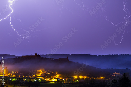 Thunderstorm over an old town