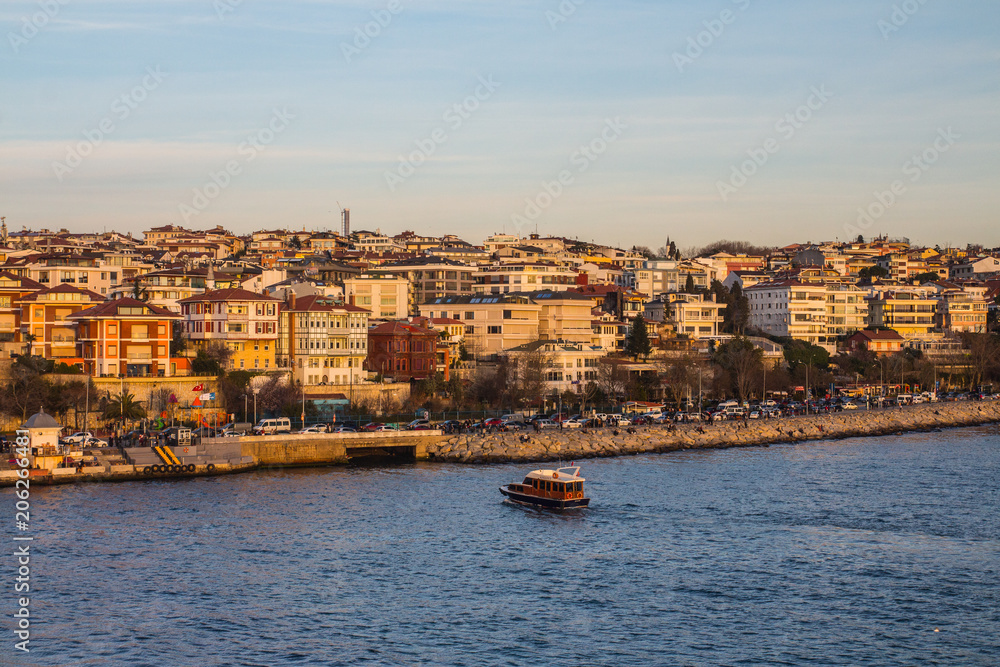 View of the Uzcudar district and the Bosphorus at sunset. Istanbul. Turkey