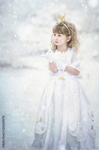 white winter wonderland snow princess catching snowflake