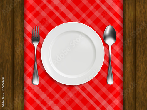 Plate, fork, spoon on a red checkered tablecloth, lie on a wooden table. realistic style. vector illustration.