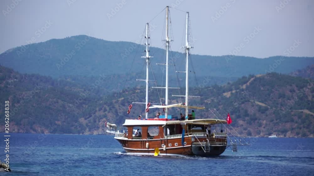Sailing boat on a motor in Mediterranean sea. Turkey. 4K. Sailing boat on a motor in Mediterranean sea. Turkey. 4K.
