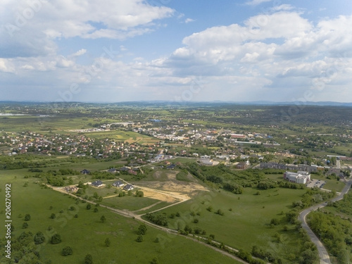 Panorama of the mestain near the town of Jaslo in Poland from a bird's eye view. Aerial photography of landscapes and settlements. Urbanization of the country. Living environment of people. 