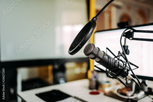 Close-up image of microphone in podcast studio. photo