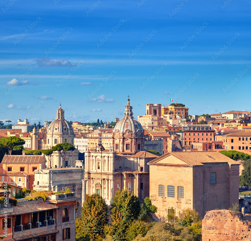 Beautiful view of Roman Forum and church cupola in Rome, Italy