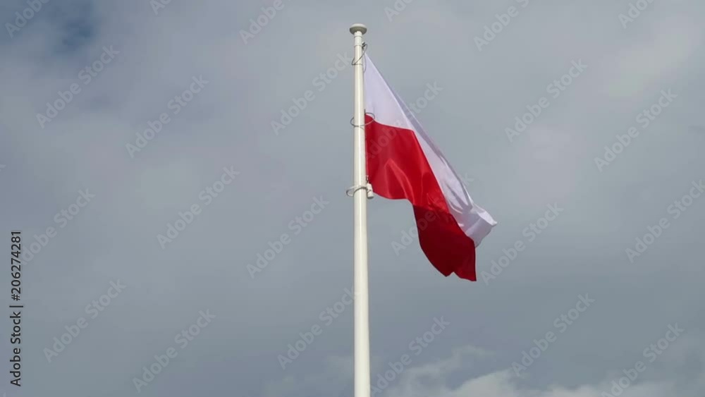 Warsaw, Poland, the polish flag in the wind Warsaw, Poland, the polish flag in the wind