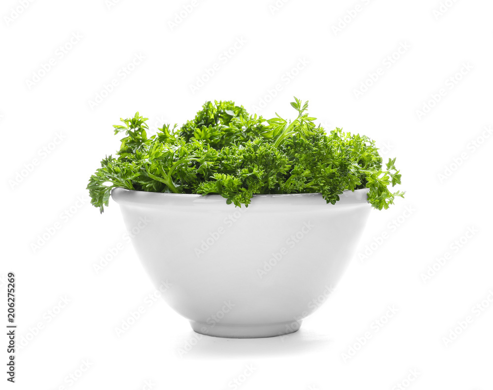 Bowl with fresh green parsley on white background Bowl with fresh green parsley on white background