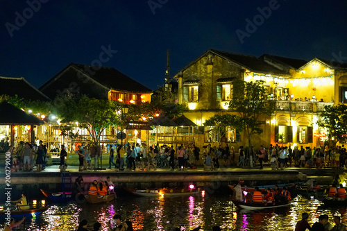 Quang Nam, Vietnam - MAY 2019: Evening on the walking street of Hoi An old town. Hoi An, once known as Faifo. Hoian is a city in Quang Nam and noted since 1999 as a UNESCO World Heritage Site photo