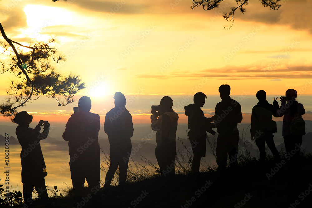 People enjoyed sunrise at the mountain top. People enjoyed sunrise at the mountain top.