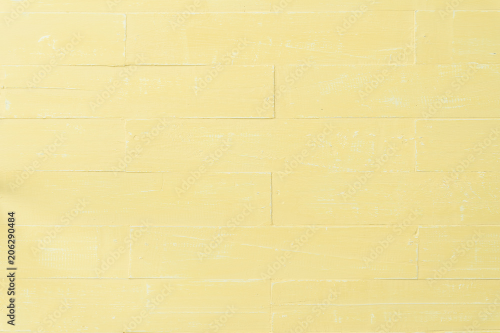Pastel bright yellow wooden table background texture. Pastel bright yellow wooden table background texture.