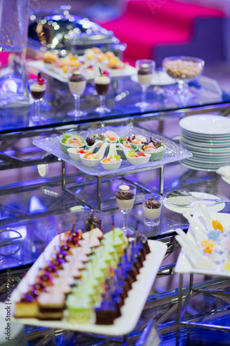 Glass shots pastry, wedding catering food, mini canapes food, tasty dessert, Beautiful decorate catering banquet table, snacks and appetizers, wedding celebration