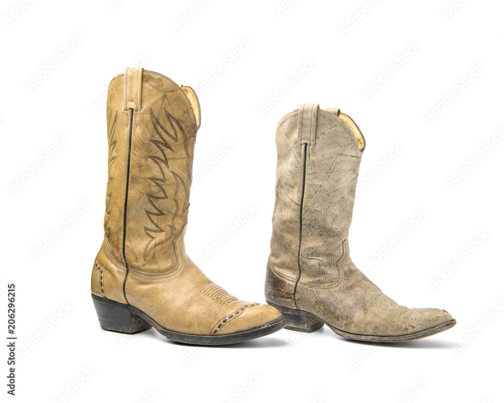 Brown cowboy boots isolated on a white background. Brown cowboy boots isolated on a white background.