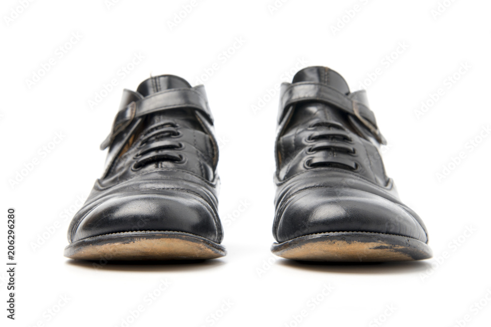 Pair of Used Businessman shoes isolated on a white background.