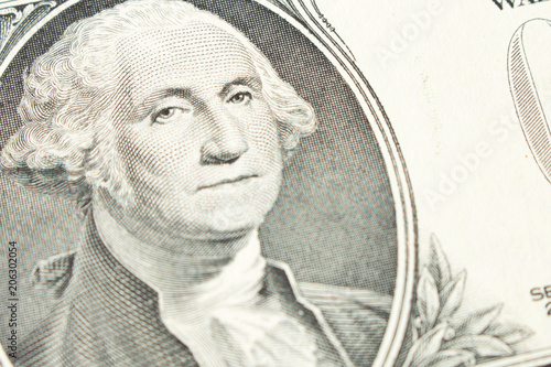 Portrait of President George Washington on 1 dollar bill. Close up