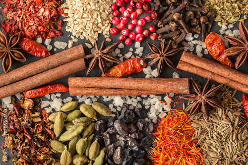  Aromatic Indian spices on a gray slate background