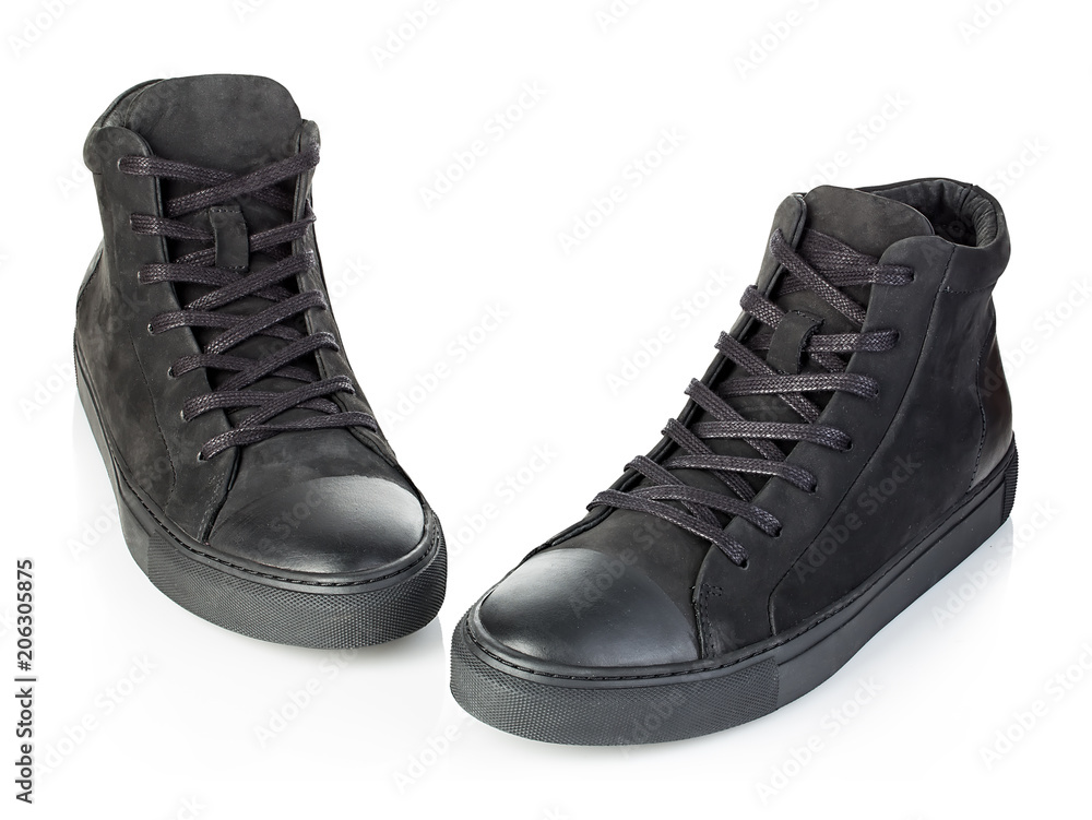Pair of new black sneakers isolated on white background