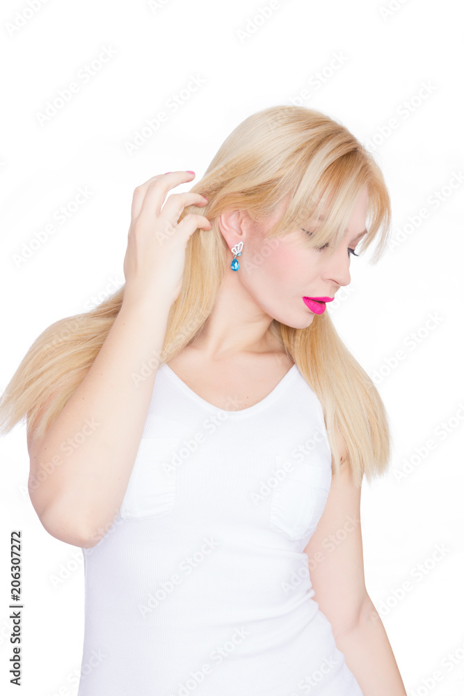 Close Up beauty portrait blonde with long hair, she with bright makeup, pink lips. Green eyes. Blue earrings. White background Close Up beauty portrait blonde with long hair, she with bright makeup, pink lips. Green eyes. Blue earrings. White background