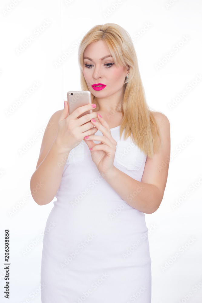 Beauty stylish woman with phone in her hands. White Background. Summer style Beauty stylish woman with phone in her hands. White Background. Summer style