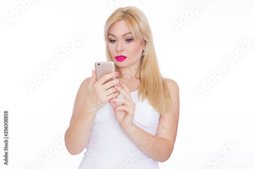 Beauty stylish woman with phone in her hands. White Background. Summer style