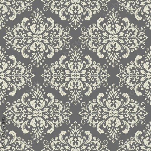 Wallpaper in the style of Baroque. A seamless vector background. Grey floral ornament. Graphic pattern for fabric, wallpaper, packaging. Ornate Damask flower ornament