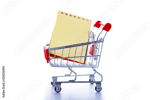 Shopping cart with a notebook