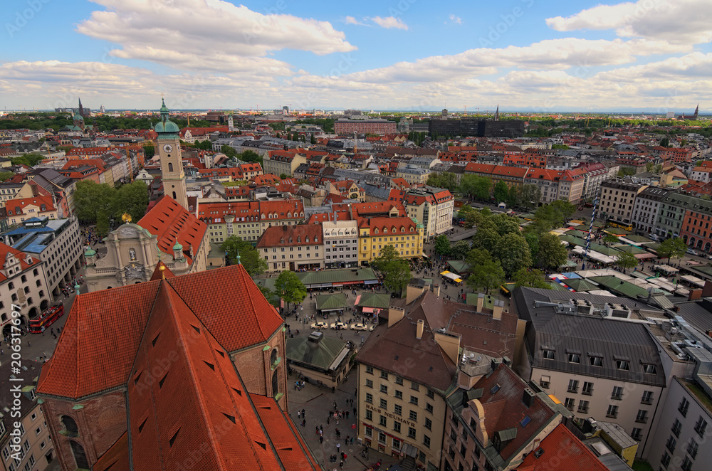 Munich, Germany-APRIL 30, 2018: Historical center panoramic aerial cityscape. Heiliggeist Church (Heiliggeistkirche). The Viktualienmarkt is a daily food market and a square in the center