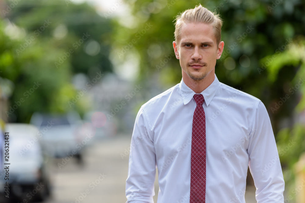 Young handsome businessman outdoors Young handsome businessman outdoors