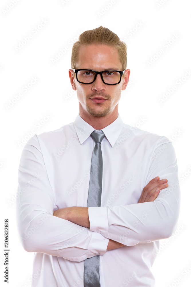 Studio shot of young handsome businessman wearing eyeglasses wit Studio shot of young handsome businessman wearing eyeglasses wit