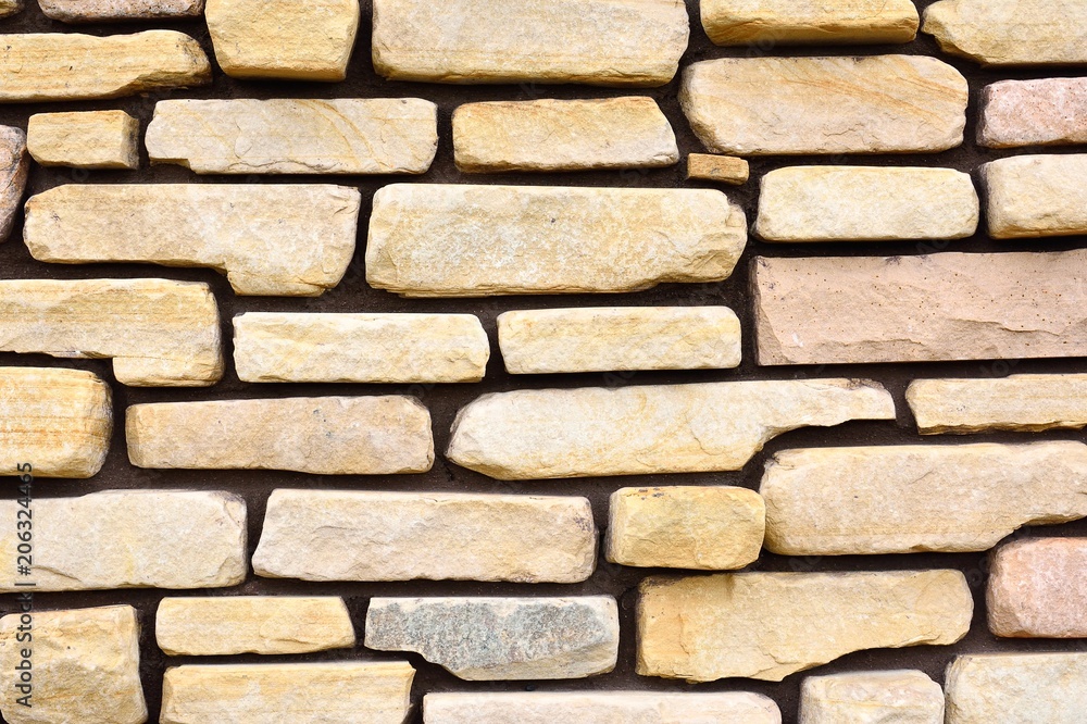 Fototapeta premium Ancient stone wall to use as background.