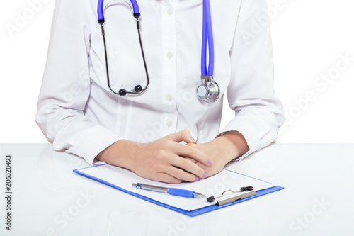 female doctor hands on white table isolated