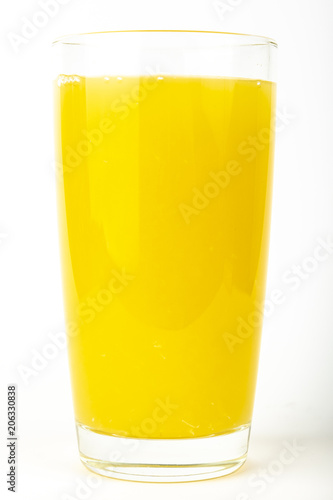 Orange juice in glass isolated on white