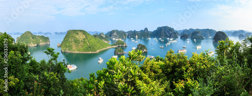 Panorama of Ha Long Bay islands, tourist boat and seascape, Ha Long, Vietnam. photo