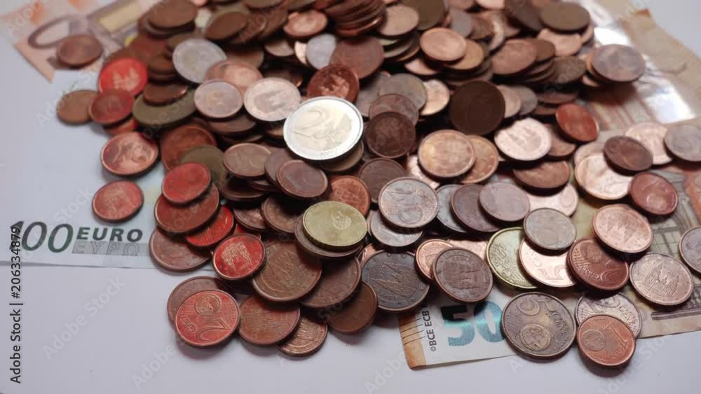 Many coins and bills, euros, money Many coins and bills, euros, money