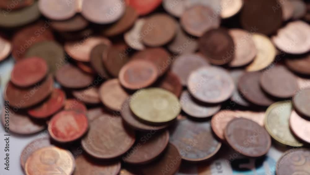 Many coins and bills, euros, money Many coins and bills, euros, money