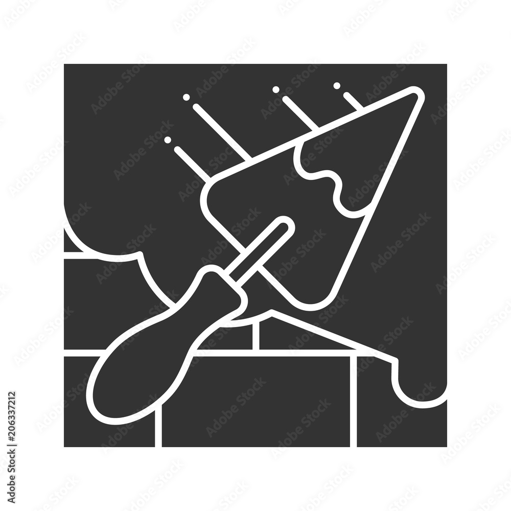 Brick wall with triangular shovel glyph icon Brick wall with triangular shovel glyph icon